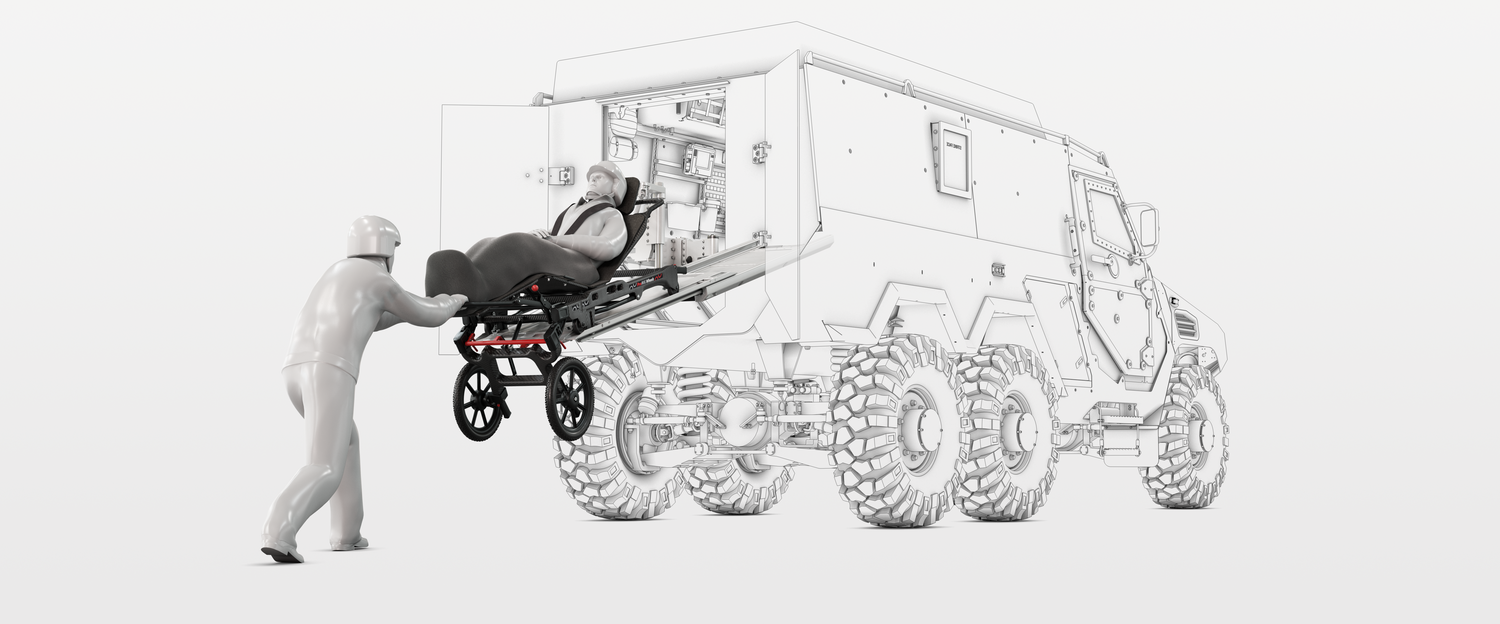 Casualty being loaded into armored military ambulance by a medic using ProMIL Wheels stretcher and ProMIL 245 stretcher loading system